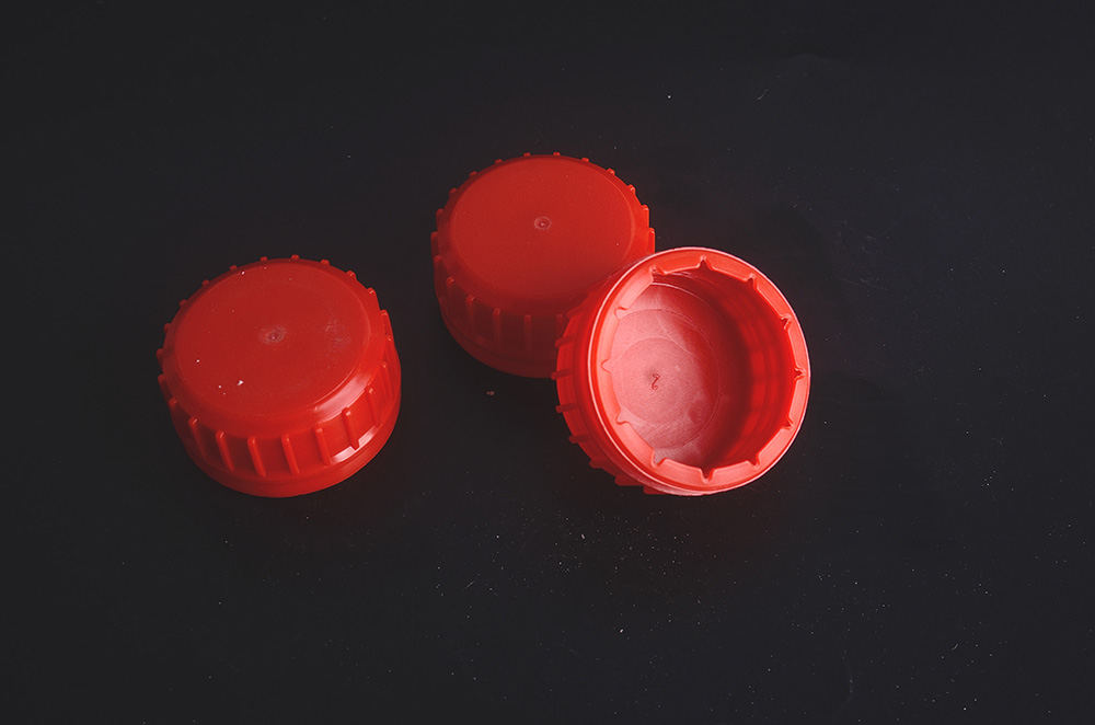 How to Achieve Consistent Cap Color Across Multi-Cavity Molds