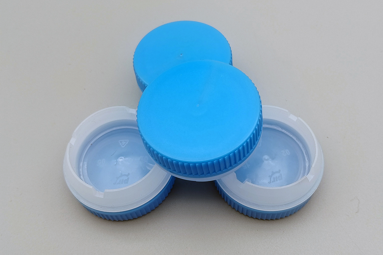 Chemical resistant oil cap